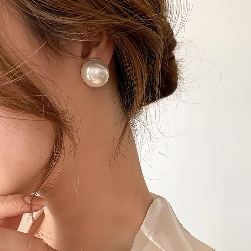 Les boucles d'oreilles perles statement