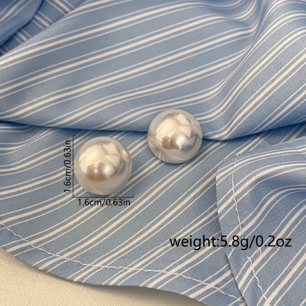 Les boucles d'oreilles perles statement