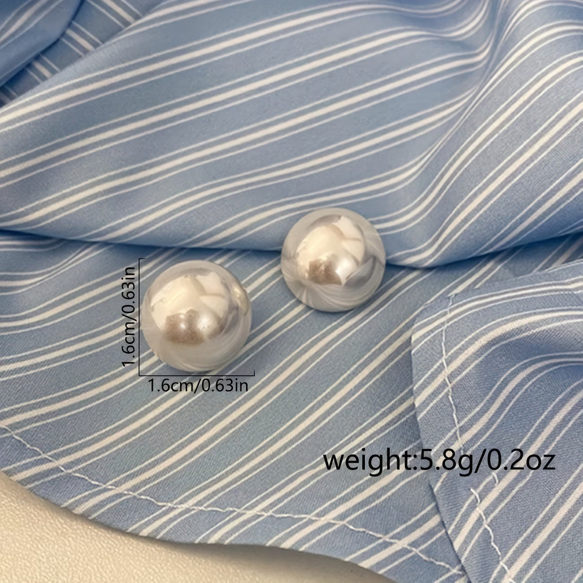 Les boucles d'oreilles perles statement