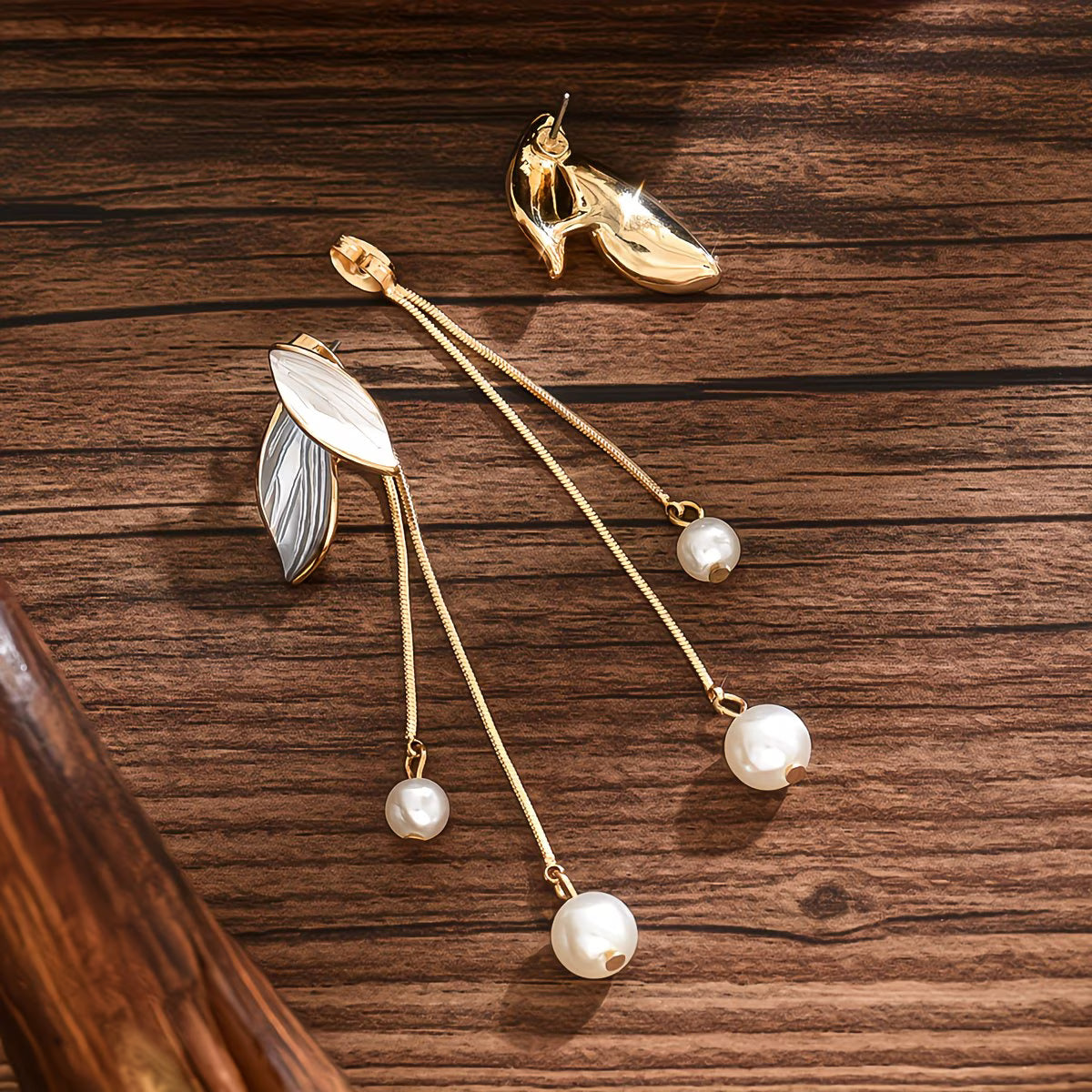 Longues boucles d'oreilles feuille avec perles