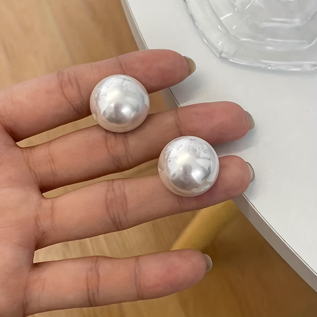 Les boucles d'oreilles perles statement