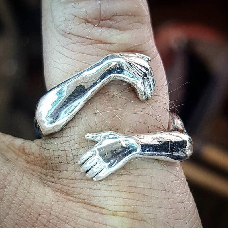 Silberring in Umarmungsdesign