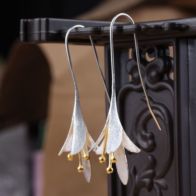 Boucles d'oreilles fleurs argentées