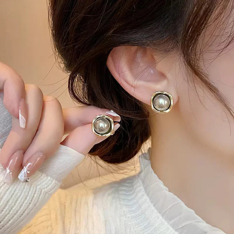 Boucles d'oreilles perles noires de luxe