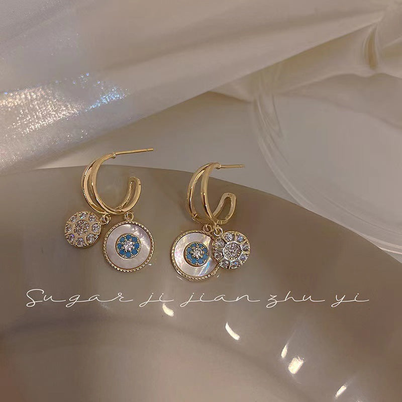 Boucles d'oreilles kaléidoscope dorées