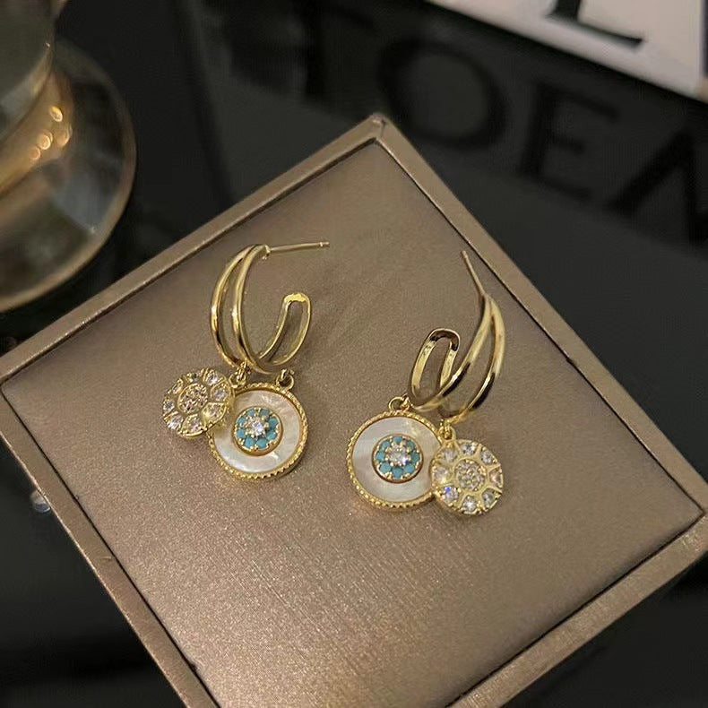 Boucles d'oreilles kaléidoscope dorées