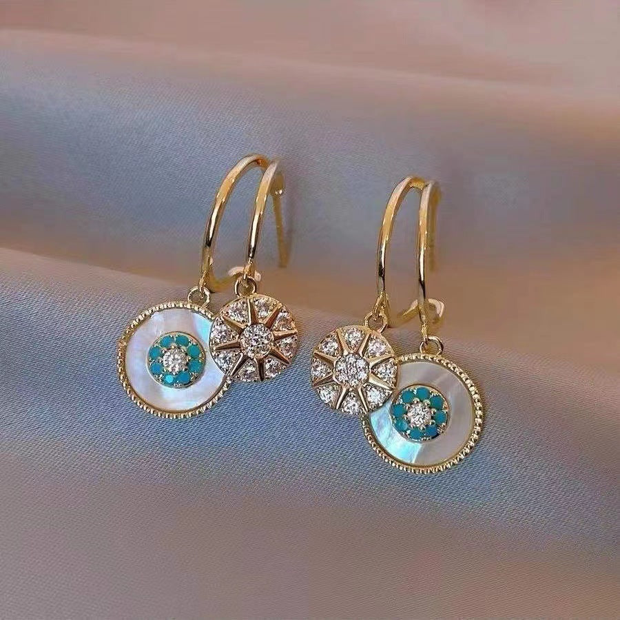 Boucles d'oreilles kaléidoscope dorées