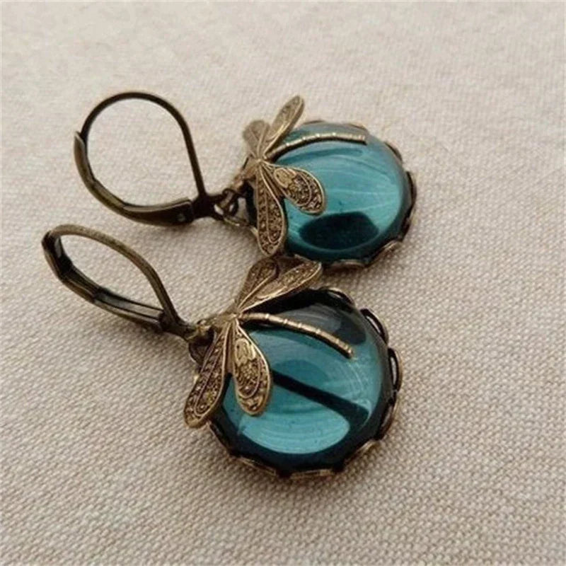 Boucles d'oreilles anciennes dorées avec cristaux en forme de libellule