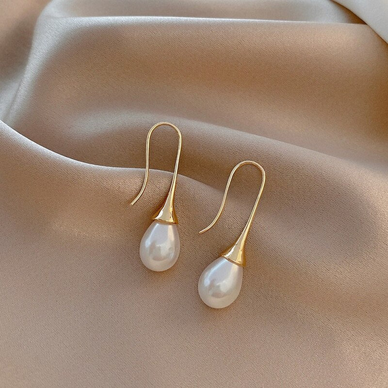 Bijou : Boucles d'oreilles pendantes avec perles