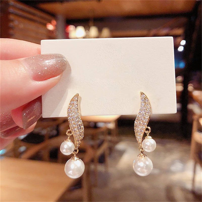 Boucles d'oreilles en perles dorées