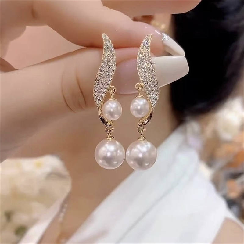 Boucles d'oreilles en perles dorées