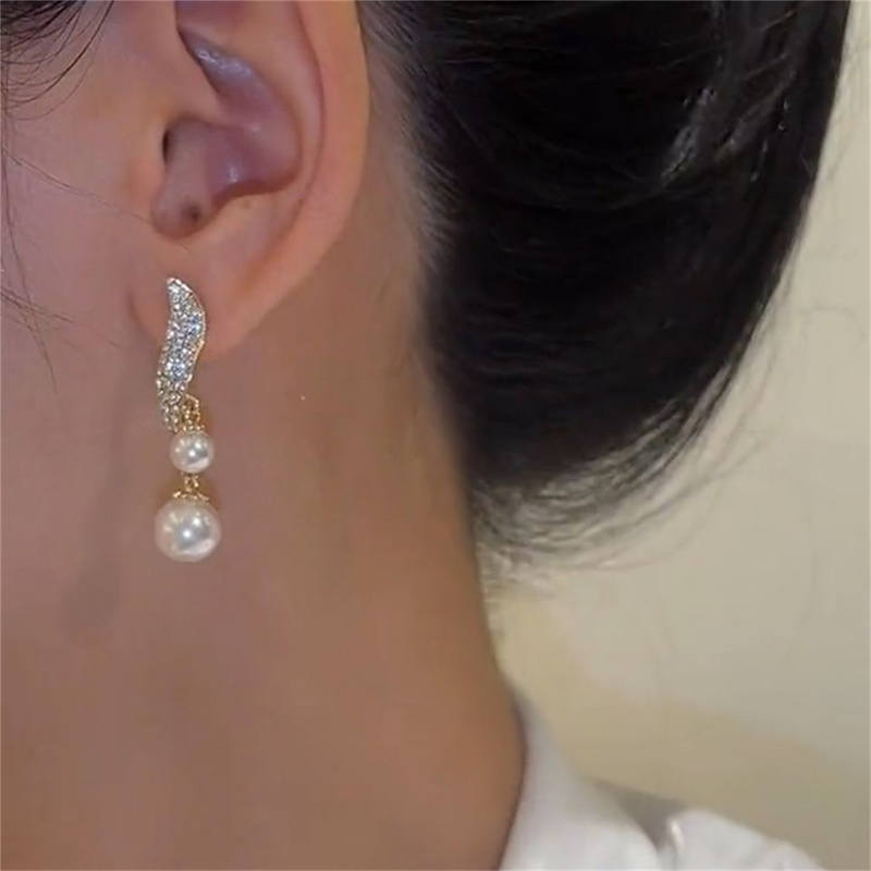 Boucles d'oreilles en perles dorées