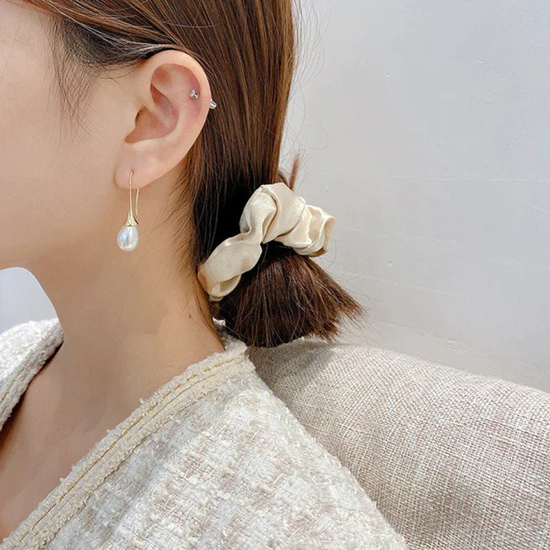 Bijou : Boucles d'oreilles pendantes avec perles