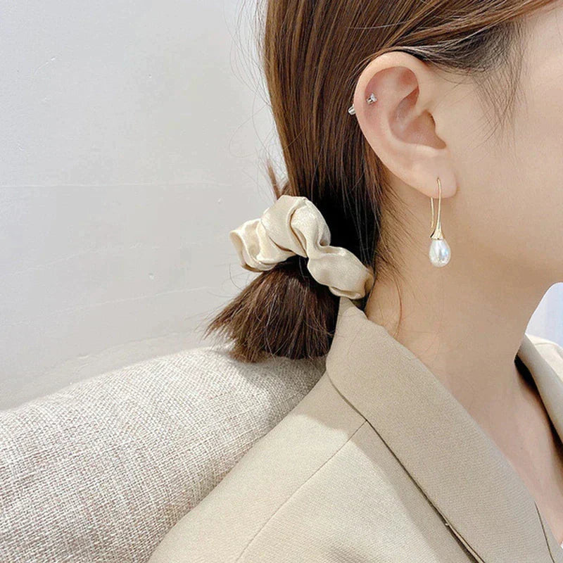 Bijou : Boucles d'oreilles pendantes avec perles
