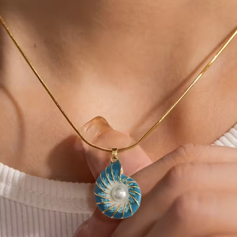 Collier pendentif perle de coquillage