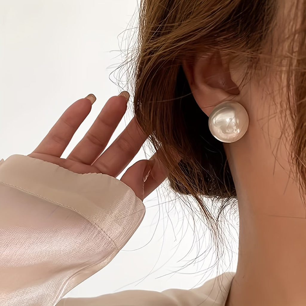 Les boucles d'oreilles perles statement