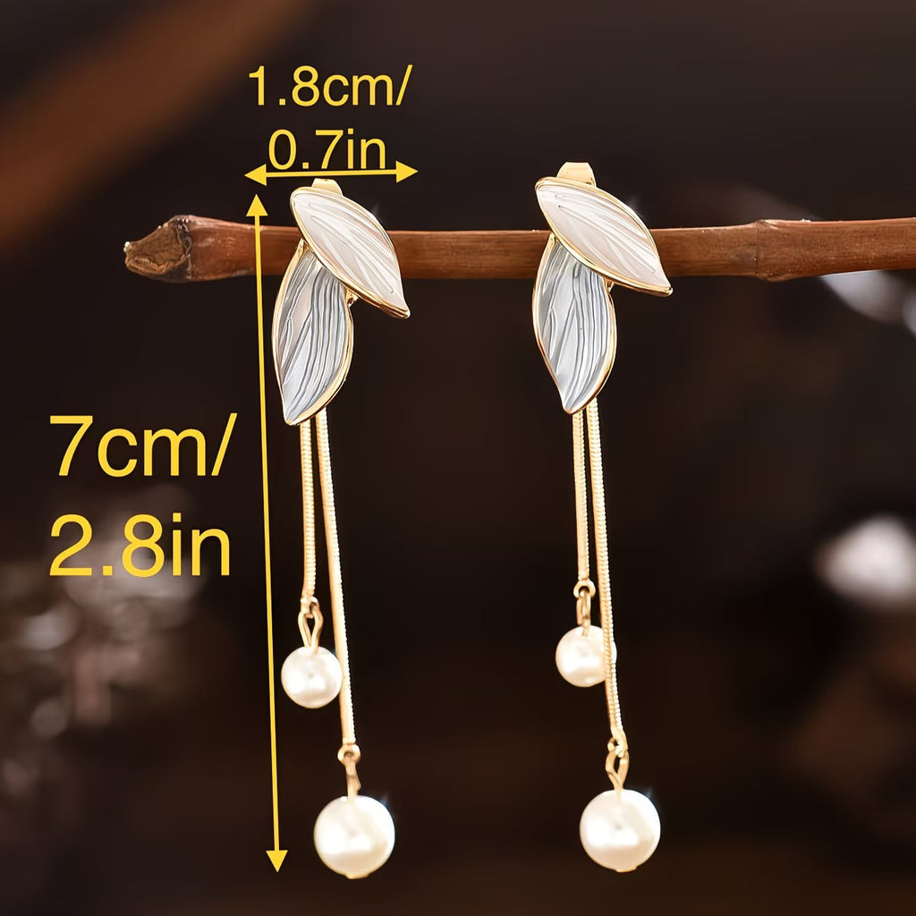 Longues boucles d'oreilles feuille avec perles