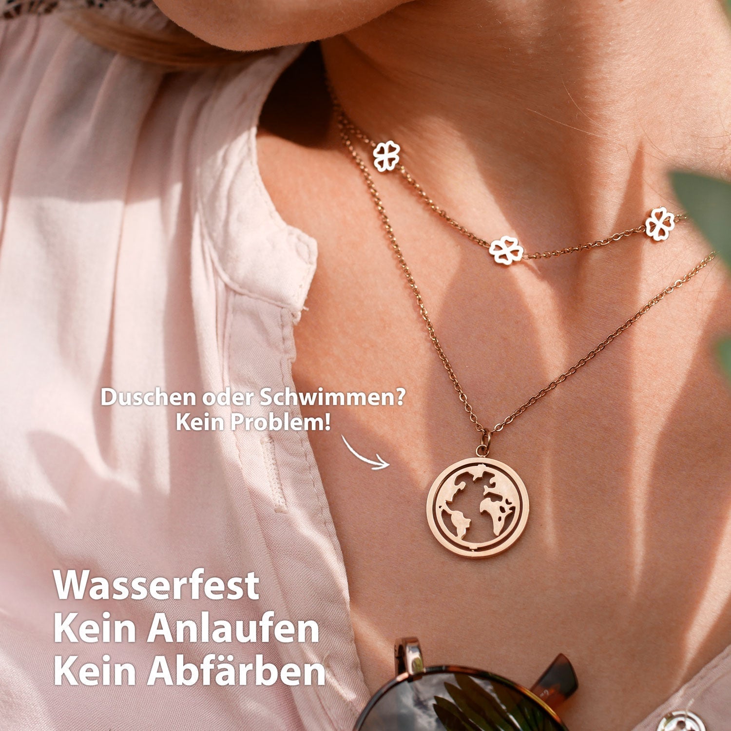 BonnyWorld Kette mit rotierbarer Weltkugel Rose