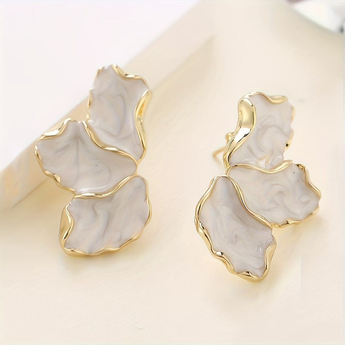 Boucles d'oreilles pétale de perle