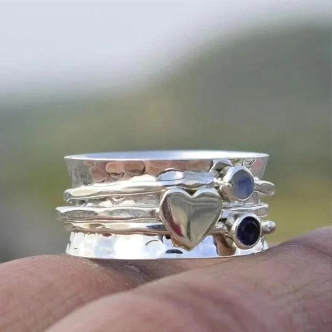 Eleganter drehbarer Herzring aus Sterlingsilber