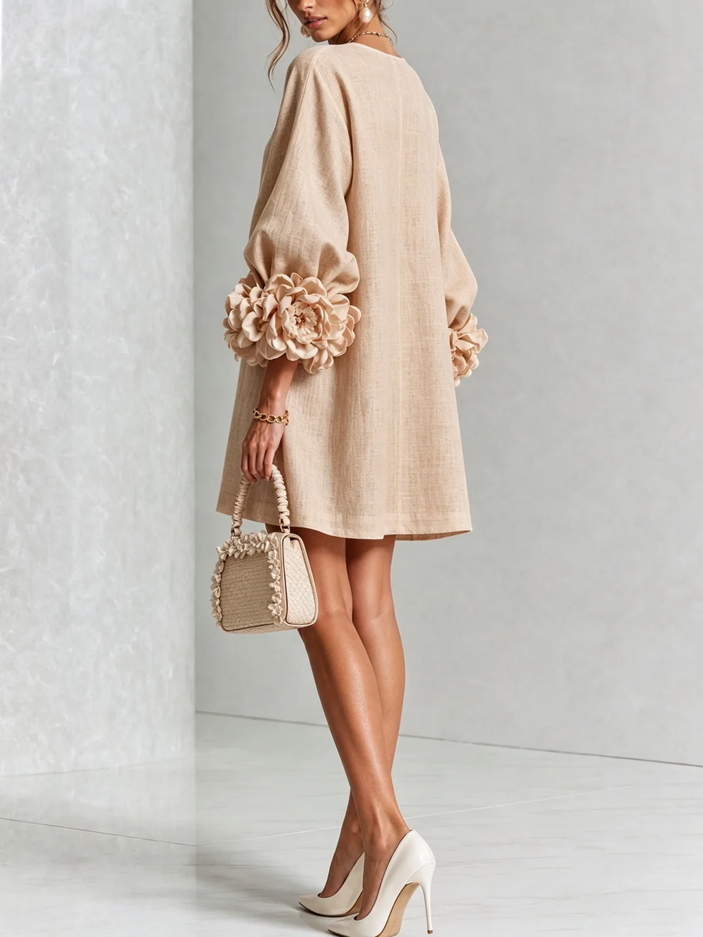 Brune | Robe courte en lin avec manches bouffantes